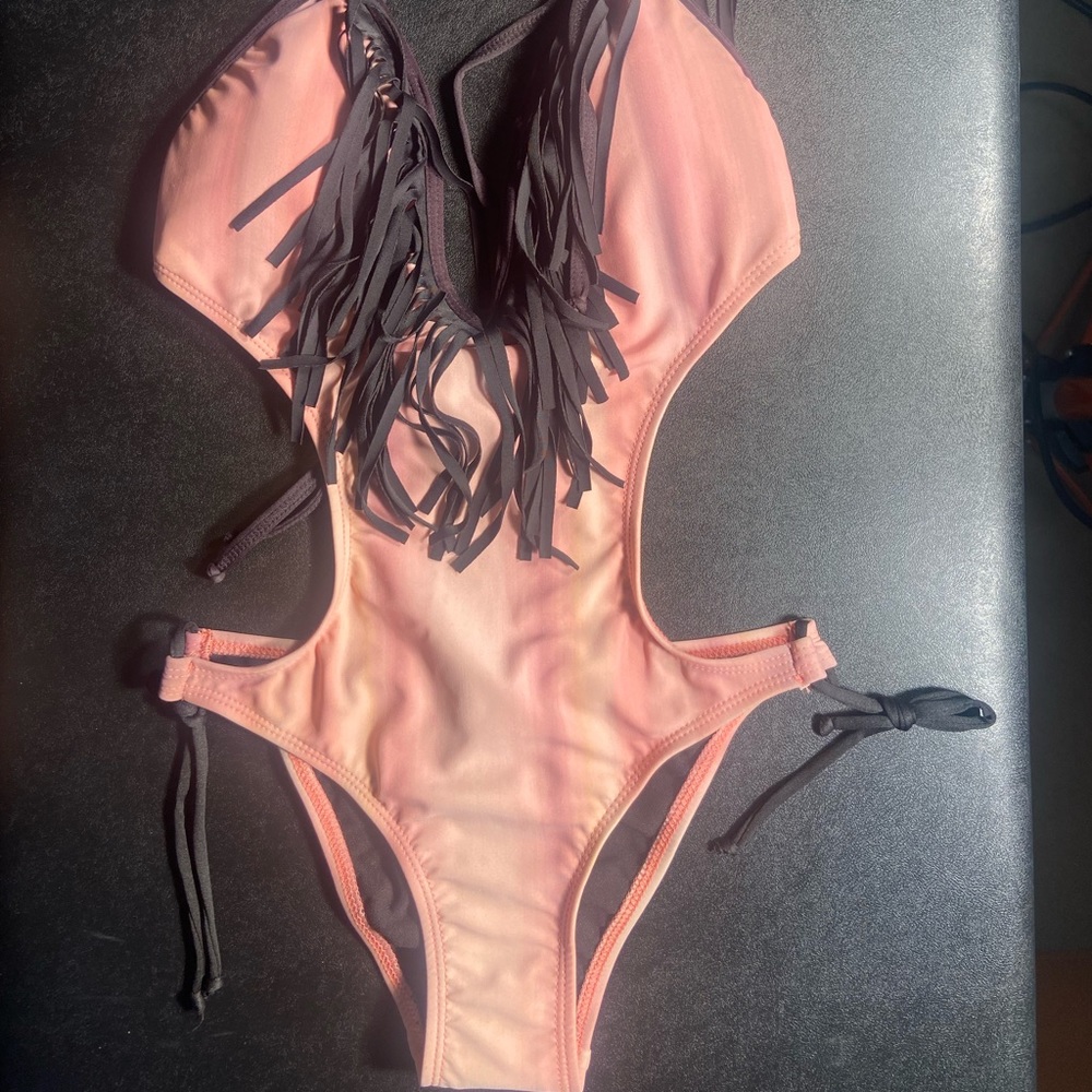 Blush tie dye monokini with black fringe & straps.